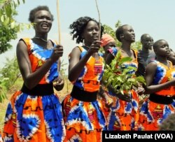 South Sudanese women at Pagirinya Refugee Settlement wore bright costumes, welcoming the UN High Commissioner with song and dance.
