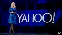 FILE - Yahoo president and CEO Marissa Mayer speaks during the International Consumer Electronics Show in Las Vegas. 