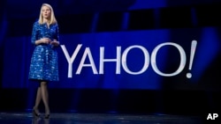 FILE - Yahoo president and CEO Marissa Mayer speaks during the International Consumer Electronics Show in Las Vegas. 