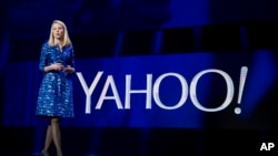 FILE - Yahoo president and CEO Marissa Mayer speaks during the International Consumer Electronics Show in Las Vegas. 
