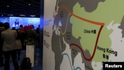 FILE - A map illustrating China's silk road economic belt and the 21st century maritime silk road, or the so-called "One Belt, One Road" megaproject, is displayed at the Asian Financial Forum in Hong Kong, China, Jan. 18, 2016.