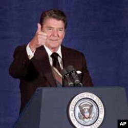 President Ronald Reagan gives thumbs up sign during a 1985 speech in Oklahoma City.