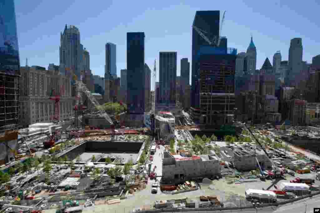 May 10: The memorial for victims of the 9-11 attacks at the site of the World Trade Center nears completion in New York. The two depressions mark the location of the original towers and will be reflecting pools. (REUTERS/Ray Stubblebine)