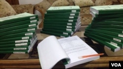 The paperwork of the fatwa on terrorism carried in 30 volumes. (J. Samnoon for VOA)