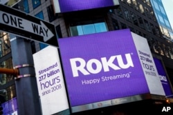FILE PHOTO A video sign displays the logo for Roku Inc, a Fox-backed video streaming firm, in Times Square after the company's IPO at the Nasdaq Market in New York, U.S., Sept. 28, 2017.