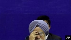 Indian Prime Minister Manmohan Singh gestures during a conference in New Delhi (file photo - February16, 2011)