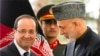 فرانسیسی صدر کا افغانستان کا دورہ، فوجی انخلاء کا اعلان