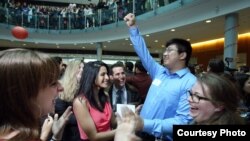 FILE - Fourth-year medical students at Johns Hopkins University School of Medicine react as they learn of residency selection on Match Day in 2015. (Photo courtesy of Johns Hopkins University School of Medicine)