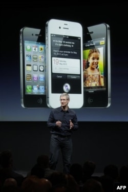 Apple CEO Tim Cook talks about the iPhone 4S during an announcement at Apple headquarters in Cupertino, Calif., Tuesday, Oct. 4, 2011. (AP Photo/Paul Sakuma)