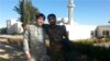 مصطفی صدرزاده در کنار ابوحامد، فرمانده لشکر فاطمیون که هر دو در سوریه کشته شده‌اند