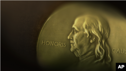 Pulitzer Prize medallion, on texture, partial graphic