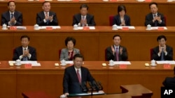 FILE - Chinese President Xi Jinping speaks at the commemorative meeting to mark the 150th anniversary of the birth of Sun Yat-sen, founding father of the Republic of China at the Great Hall of the People in Beijing, China, Nov. 11, 2016.