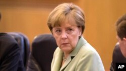 « Nous ne sommes plus au temps de la guerre froide », a rappelé la chancellière allemande, Angela Merkel (Photo AP)