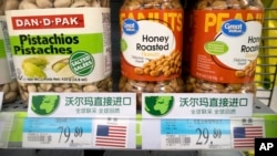 Imported nuts from the United States are displayed at a supermarket in Beijing, March 23, 2018. China announced a $3 billion list of U.S. goods including pork, apples and steel pipe.