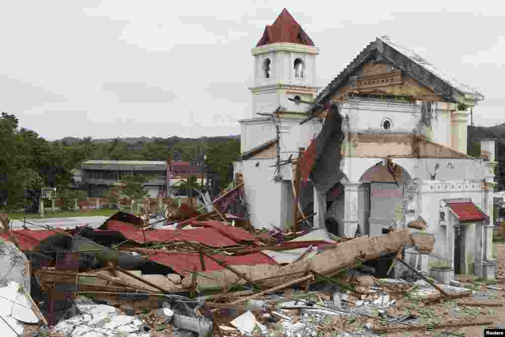 A view of the destroyed St. Michael Parish church in Clarin, Bohol a day after an earthquake hit, central Philippines, Oct. 16, 2013.