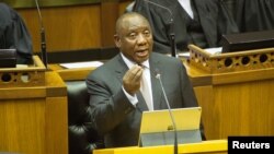 FILE - South African President Cyril Ramaphosa delivers his State of the Nation address at Parliament in Cape Town, South Africa, Feb. 7, 2019.