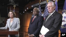 House Minority Leader Nancy Pelosi, left, accompanied by House Minority Whip Steny Hoyer, right, and House Assistant Minority Leader James Clyburn, speaks during a news conference on Capitol Hill, February 18, 2011