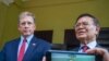 Kem Sokha, leader of the banned opposition CNRP party, talks briefly to reporters after a meeting with US Ambassador to Cambodia Patrick Murphy (left) at his house in Phnom Penh, November 11, 2019. (Khan Sokummono/VOA Khmer)