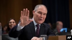 FILE - Environmental Protection Agency Administrator-designate Scott Pruitt testifies on Capitol Hill in Washington, Jan. 18, 2017, at his confirmation hearing before the Senate Environment and Public Works Committee. 