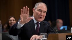 Environmental Protection Agency Administrator-designate, Oklahoma Attorney General Scott Pruitt, testifies on Capitol Hill in Washington, Jan. 18, 2017, at his confirmation hearing before the Senate Environment and Public Works Committee. 