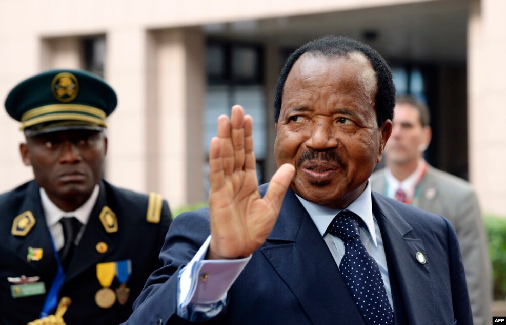 FILE - Cameroon's President Paul Biya waves as he arrives at an EU-Africa summit on April 3, 2014, at EU Headquarters in Brussels.