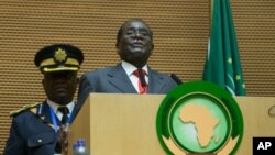 FILE - Zimbabwe president Robert Mugabe delivers a speech during the opening ceremony of the 26 ordinary of the African Union Summit in Ethiopian capital Addis Ababa, Jan. 30, 2016. 