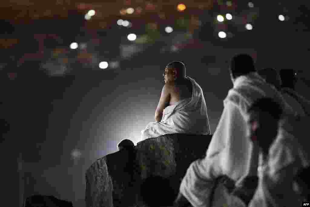 Muslim pilgrims gather on Mount Arafat near Mecca as they perform one of a series of Hajj rituals late in the day. 