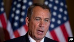 House Speaker John Boehner of Ohio speaks about the ongoing budget battle, Oct. 8, 2013, outside his office on Capitol Hill in Washington.