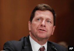 FILE- Securities and Exchange Commission (SEC) Chairman nominee Jay Clayton testifies on Capitol Hill in Washington at his confirmation hearing before the Senate Banking Committee, March 23, 2017.