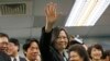 FILE - Taiwan's main opposition Democratic Progressive Party, DPP, Chairperson Tsai Ing-wen waves at the close of a press conference in Taipei, Taiwan.