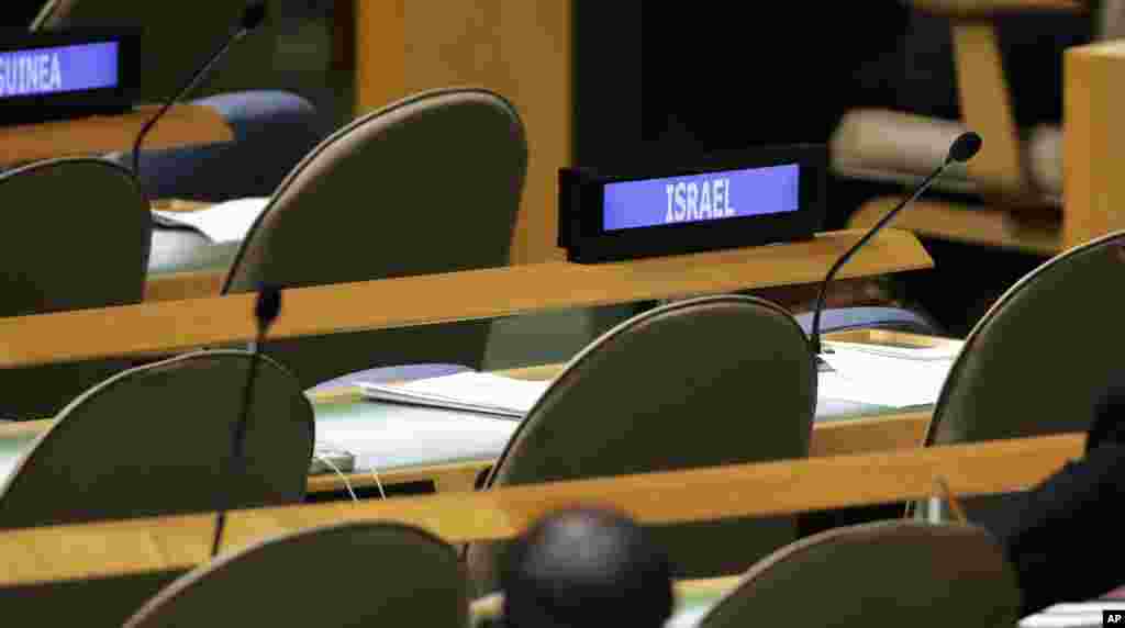 The Israel delegation seats are empty as Iranian President Hassan Rouhani addresses the 69th session of the United Nations General Assembly, at U.N. headquarters, New York, Sept. 25, 2014. 