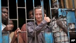 David Cecil, the British producer of the play "The River and the Mountain" concerning the condition of Uganda's gays, in a court cell in Kampala on September 13, 2012. 