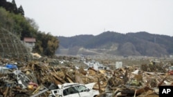 A month following the quake and tsunami much of Rikuzentakata in Iwate Prefecture still lies in ruin.