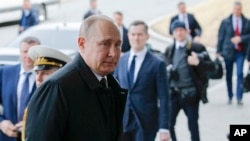 Russian President Vladimir Putin arrives to meet with North Korea's leader Kim Jong Un in Vladivostok, Russia, Thursday, April 25, 2019. (AP Photo/Alexander Zemlianichenko)