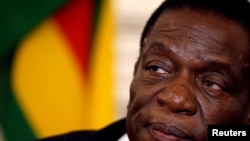 FILE - Zimbabwean President Emmerson Mnangagwa is pictured at a news conference at the State House in Harare, Zimbabwe, Aug. 3, 2018. 
