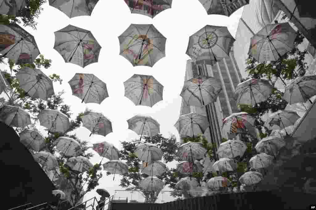 Umbrellas are displayed in front of the City Hall in Seoul, South Korea. The display symbolizes public officials' slogan to be an umbrella or to protect Seoul citizens.