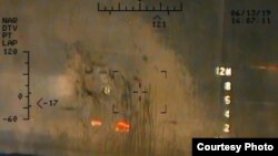 The Pentagon has released new photographs that it says offer more proof that Iran attacked two foreign oil tankers in the Gulf of Oman last week.