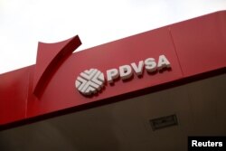 The corporate logo of the state oil company PDVSA is seen at a gas station in Caracas, Venezuela, March 22, 2017.