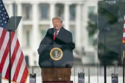 FILE - President Donald Trump speaks during a rally protesting the electoral college certification of Joe Biden as President, Jan. 6, 2021, in Washington. A Facebook board has decided to uphold the company’s suspension of the former president's account. (AP Photo/Evan Vucci)