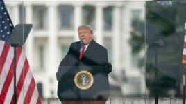 FILE - President Donald Trump speaks during a rally protesting the electoral college certification of Joe Biden as President, Jan. 6, 2021, in Washington. A Facebook board has decided to uphold the company’s suspension of the former president's account. (AP Photo/Evan Vucci)