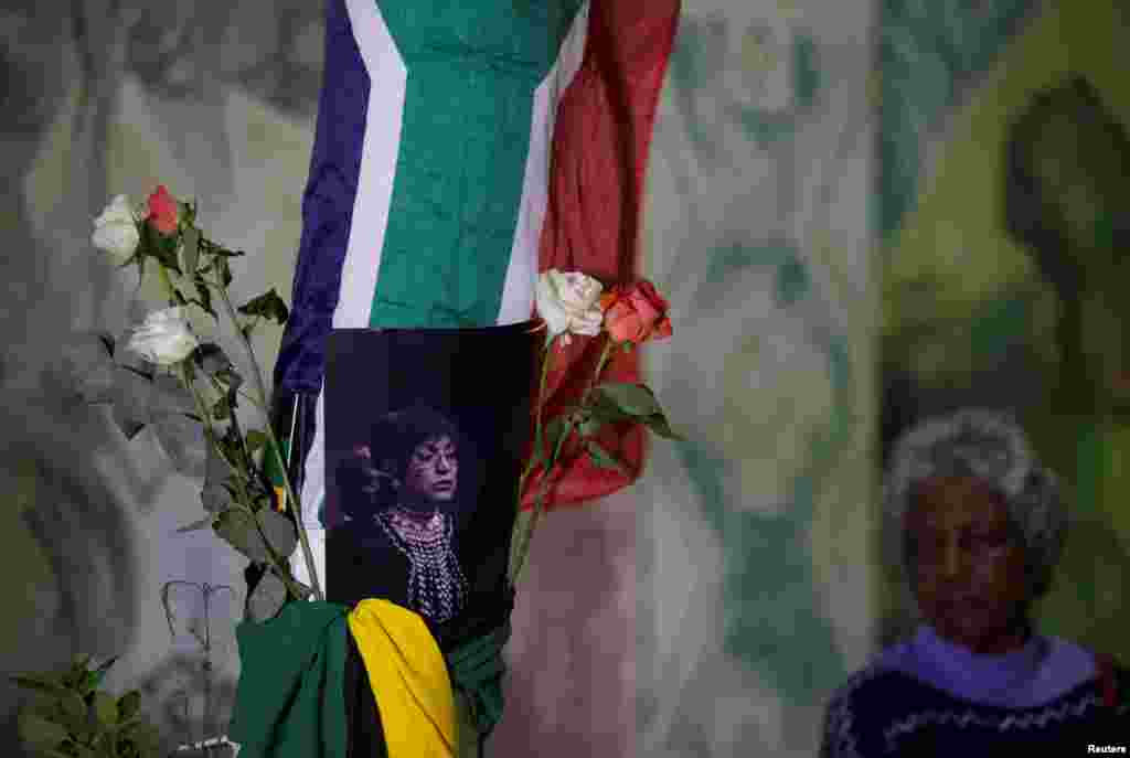 People gather to pay their respects to Winnie Madikizela-Mandela in Durban, South Africa, April 2, 2018. 