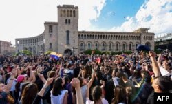 People celebrate Armenian prime minister Serzh Sarkisian's resignation in downtown Yerevan, April 23, 2018.