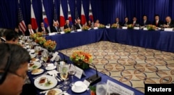 U.S. President Donald Trump meets with South Korean President Moon Jae-in, Japanese Prime Minister Shinzo Abe and others during the U.N. General Assembly in New York, Sept. 21, 2017.