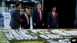 President Donald Trump tours a Foxconn facility, June 28, 2018, in Mt. Pleasant, Wisconsin. 