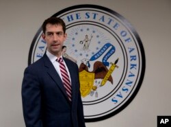 Sen. Tom Cotton, R-Ark. arrives in his office on Capitol Hill in Washington, March 11, 2015.