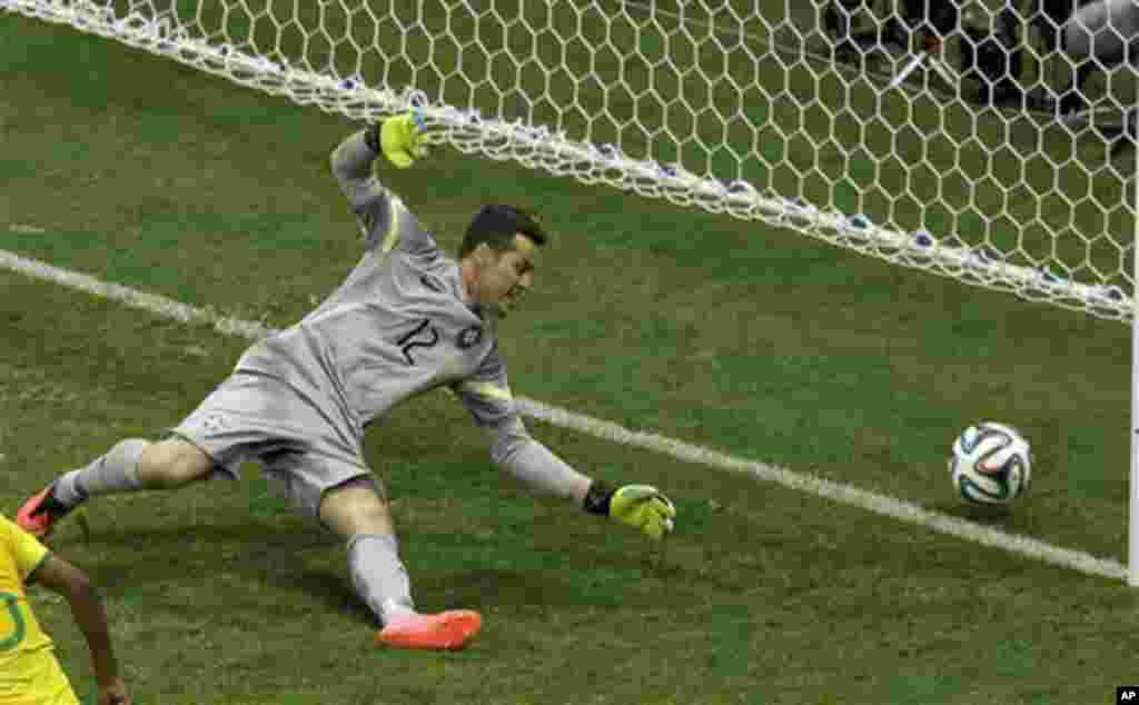 Brazil's goalkeeper Julio Cesar fails to stop Netherland's third goal during the World Cup third-place soccer match between Brazil and the Netherlands at the Estadio Nacional in Brasilia, Brazil, Saturday, July 12, 2014. (AP Photo/Themba Hadebe)