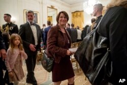 FILE - Sen. Amy Klobuchar, Democrat-Minnesota, departs following a ceremony in the East Room of the White House in Washington, Nov. 16, 2018.