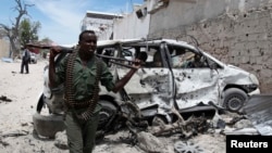 Somali soldier after explosion near Al Mukaram Hotel, Mogadishu, March 15, 2014.