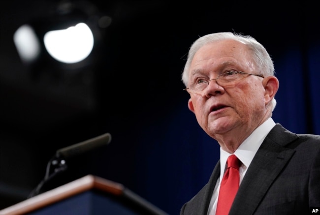 FILE - Jeff Sessions, U.S. attorney general at the time, speaks during a news conference at the Department of Justice in Washington, Nov. 1, 2018.