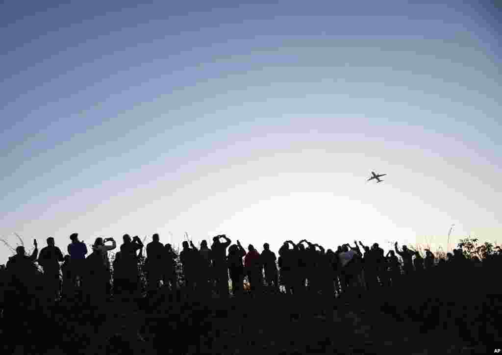 Hundreds of people watch and photograph the Airbus of the French airline Air France taking off from Tegel (TXL) airport in Berlin, Germany.&nbsp;Tegel Airport closes with the departure of the last scheduled flight number AF 1235 to Paris.